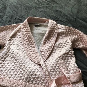Long pink quilted robe.